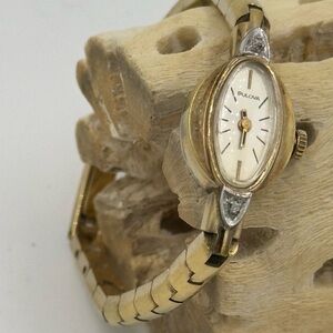Vintage Bulova Women's Gold and White Watch
